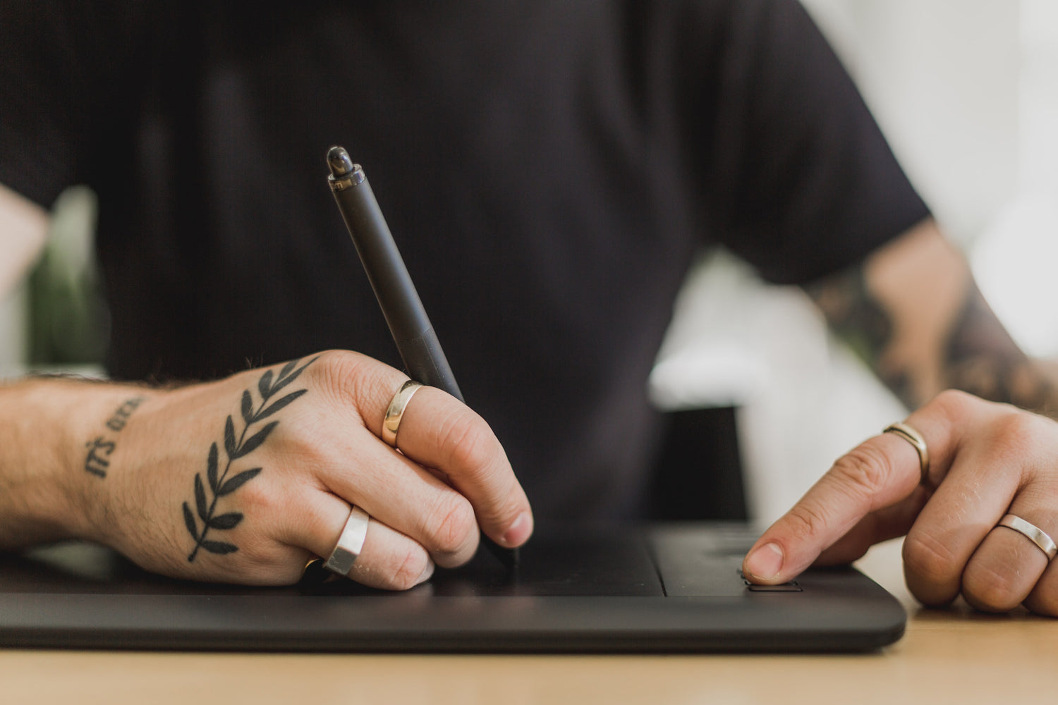 hands-using-tablet-for-design-editing